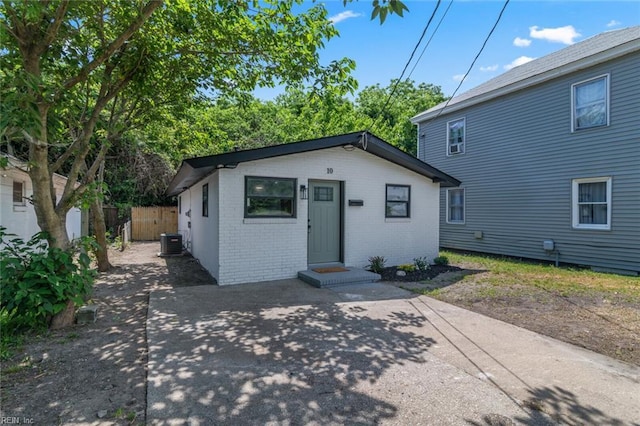 10 Hopkins St, Hampton, VA 23663 - view of front of property with central AC unit, brick siding, and a patio area