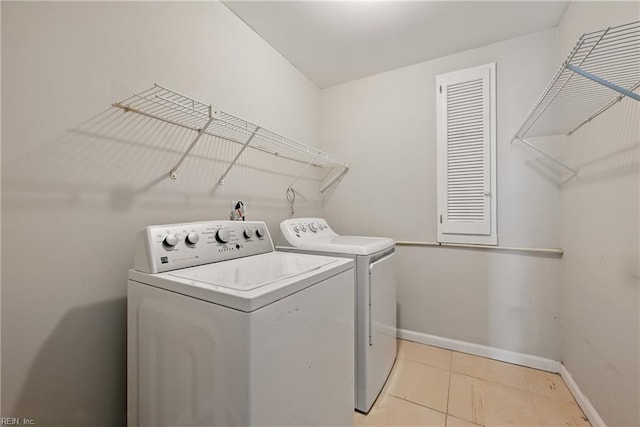 1405 Collingswood Trl, Virginia Beach, VA 23464 - laundry area featuring washing machine and clothes dryer, baseboards, and light tile patterned flooring