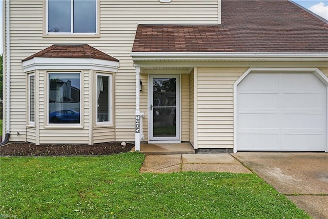 1405 Collingswood Trl, Virginia Beach, VA 23464 - doorway to property with driveway, a lawn, and roof with shingles