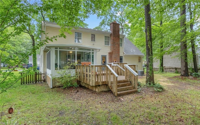 745 Denver Ave, Chesapeake, VA 23322 - back of house featuring a sunroom, a chimney, a wooden deck, and central air condition unit
