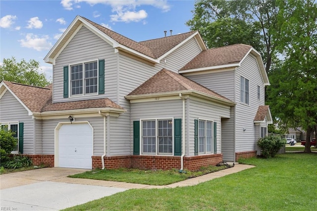 103 Penny Ln, Yorktown, VA 23692 - traditional-style house with a shingled roof, concrete driveway, a front lawn, an attached garage, and brick siding