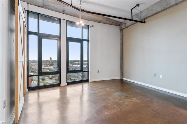 415 Saint Pauls Blvd Unit 609, Norfolk, VA 23510 - unfurnished room featuring concrete flooring and baseboards