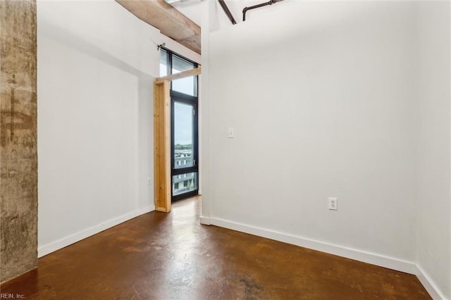 415 Saint Pauls Blvd Unit 609, Norfolk, VA 23510 - empty room featuring finished concrete flooring and baseboards