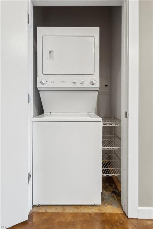 415 Saint Pauls Blvd Unit 609, Norfolk, VA 23510 - laundry room featuring stacked washer / drying machine and baseboards