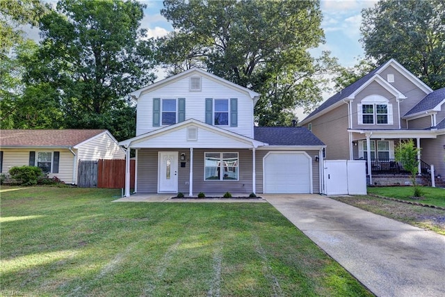 39 Morrison Ave, Newport News, VA 23601 - traditional-style home featuring covered porch, a garage, and driveway