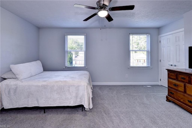 39 Morrison Ave, Newport News, VA 23601 - bedroom featuring baseboards, carpet floors, ceiling fan, and a textured ceiling