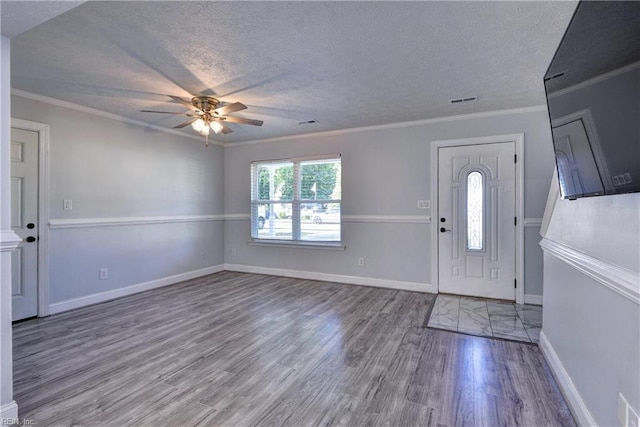 39 Morrison Ave, Newport News, VA 23601 - foyer entrance with a ceiling fan, wood finished floors, a textured ceiling, baseboards, and crown molding