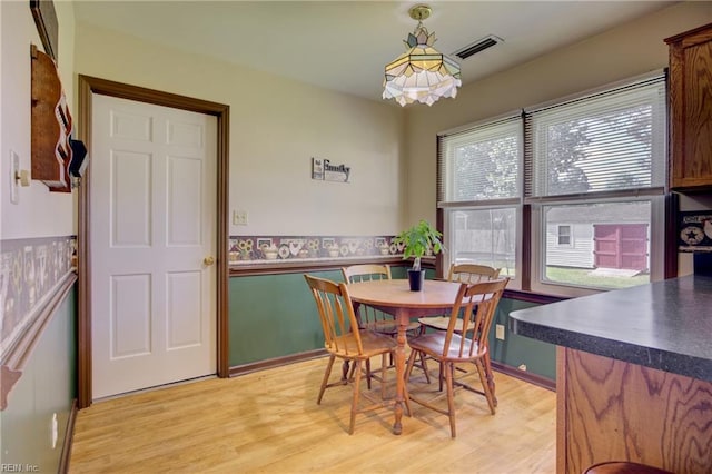 4217 Meadowgate Ct, Chesapeake, VA 23321 - dining space with light wood-type flooring and a chandelier