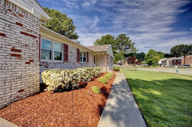 4217 Meadowgate Ct, Chesapeake, VA 23321 - view of property exterior with brick siding and a lawn