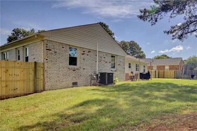 4217 Meadowgate Ct, Chesapeake, VA 23321 - rear view of house with cooling unit, brick siding, and crawl space