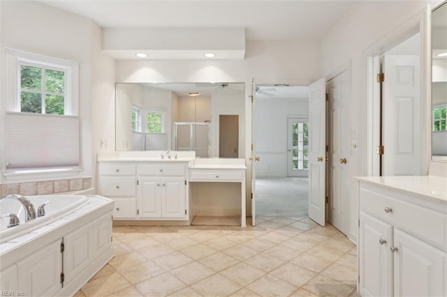 133 Sugar Bush, Williamsburg, VA 23188 - bathroom with a shower stall, vanity, a garden tub, recessed lighting, and a ceiling fan