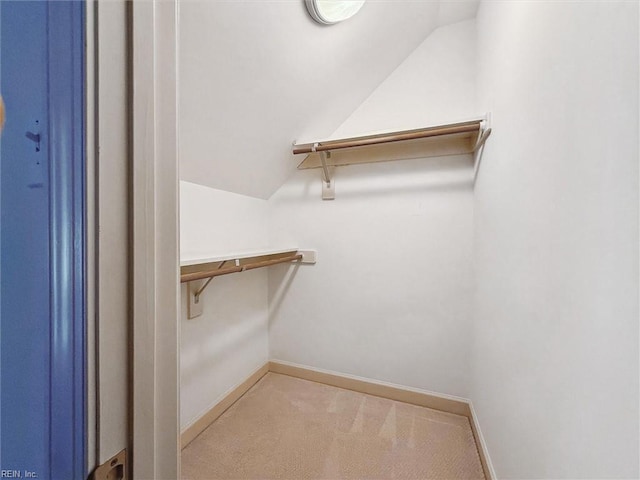 133 Sugar Bush, Williamsburg, VA 23188 - spacious closet featuring vaulted ceiling and carpet flooring