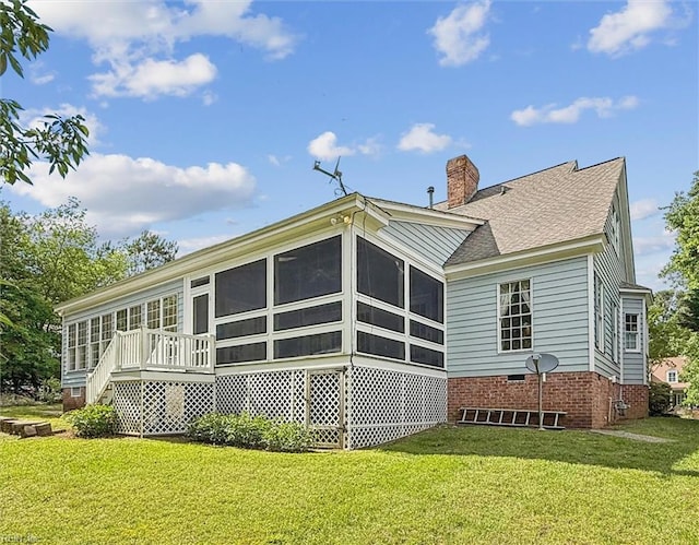 133 Sugar Bush, Williamsburg, VA 23188 - back of property featuring a sunroom, a yard, a chimney, roof with shingles, and crawl space