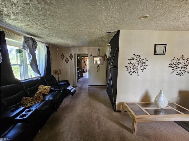 1428 24th St, Newport News, VA 23607 - living area with a textured ceiling, carpet, and baseboards