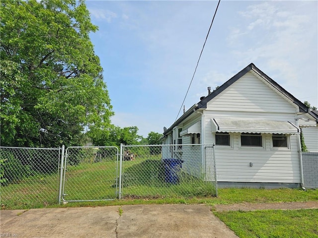 1428 24th St, Newport News, VA 23607 - view of side of property featuring a gate