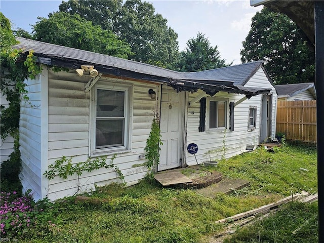 1428 24th St, Newport News, VA 23607 - view of front facade with roof with shingles