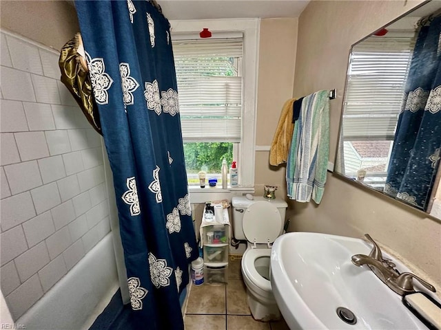 3860 Nansemond Cir, Norfolk, VA 23513 - bathroom featuring a sink, tile patterned flooring, toilet, and shower / bathtub combination with curtain