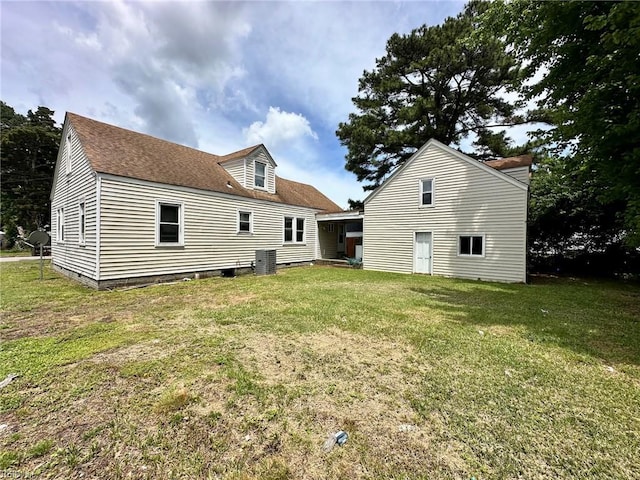3860 Nansemond Cir, Norfolk, VA 23513 - rear view of property featuring a yard, a shingled roof, and cooling unit