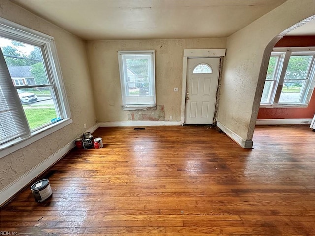 3860 Nansemond Cir, Norfolk, VA 23513 - foyer with plenty of natural light, baseboards, hardwood / wood-style floors, and a textured wall
