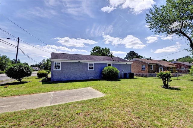 717 S Fallon Ct, Hampton, VA 23661 - rear view of house featuring central AC and brick siding