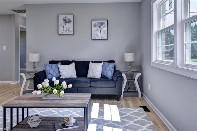 717 S Fallon Ct, Hampton, VA 23661 - living area featuring wood finished floors and baseboards