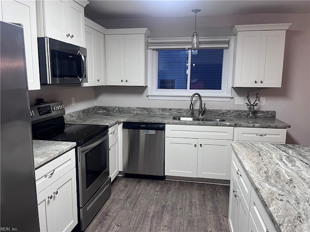 11 Greenwood Rd, Newport News, VA 23601 - kitchen featuring stainless steel appliances, a sink, dark wood-type flooring, and white cabinetry