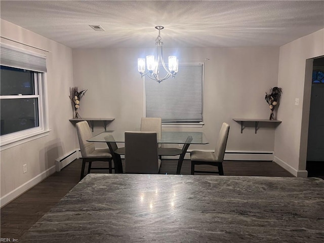 11 Greenwood Rd, Newport News, VA 23601 - dining area featuring a baseboard heating unit, a chandelier, dark wood-type flooring, and baseboards