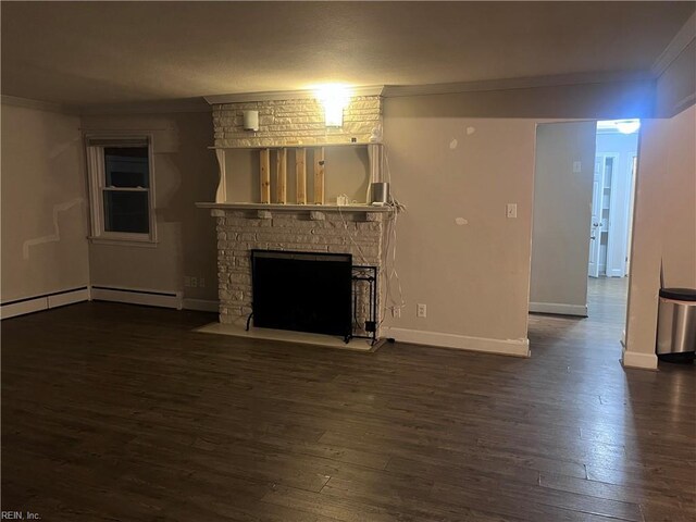 11 Greenwood Rd, Newport News, VA 23601 - unfurnished living room with crown molding, dark wood-style floors, a stone fireplace, and baseboards