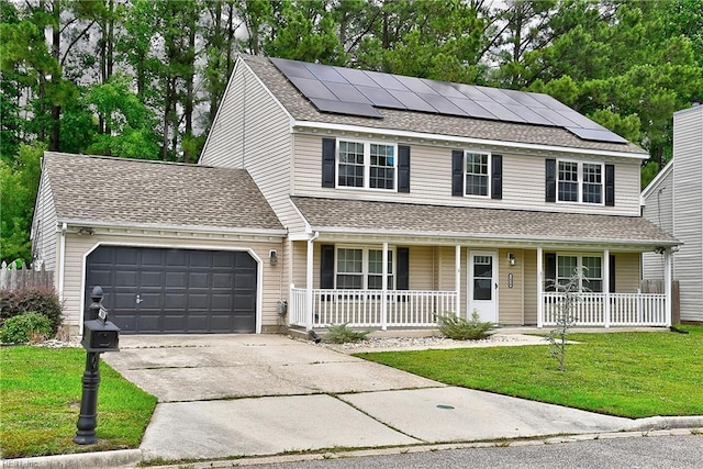 2450 Cherry Blossom Dr, Suffolk, VA 23434 - traditional-style house featuring a porch, a garage, a front lawn, and driveway