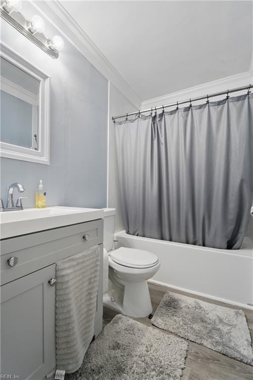 6628 Glenoak Dr, Norfolk, VA 23513 - full bath with vanity, crown molding, shower / tub combo with curtain, toilet, and wood finished floors