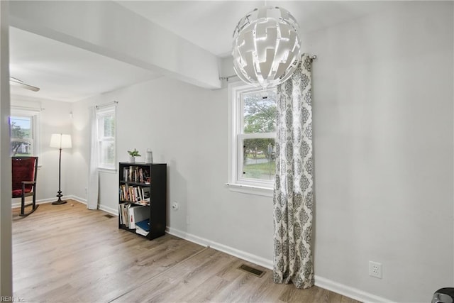 6628 Glenoak Dr, Norfolk, VA 23513 - dining room with a chandelier, light wood-type flooring, and baseboards