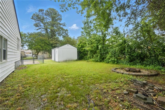 6628 Glenoak Dr, Norfolk, VA 23513 - view of yard featuring a fire pit and a gate