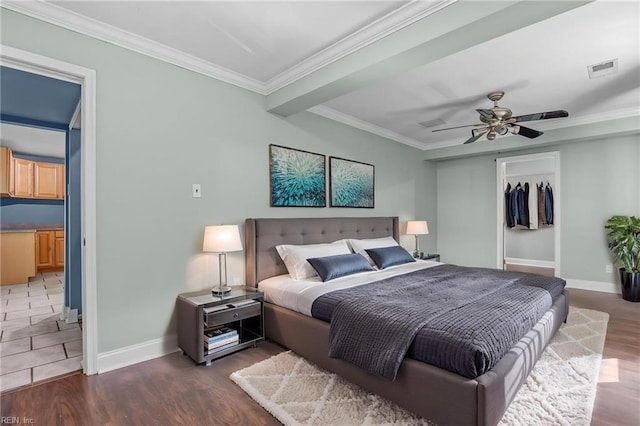 4704 Lonewillow Ln, Virginia Beach, VA 23455 - bedroom featuring baseboards, crown molding, a closet, wood finished floors, and ceiling fan