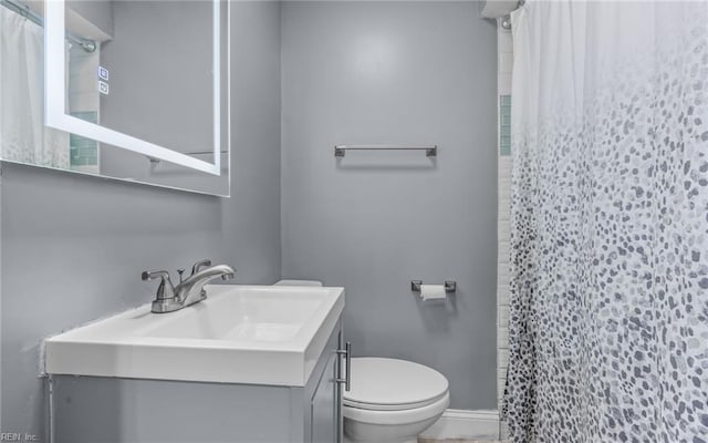 4704 Lonewillow Ln, Virginia Beach, VA 23455 - bathroom with toilet, vanity, and a shower with curtain