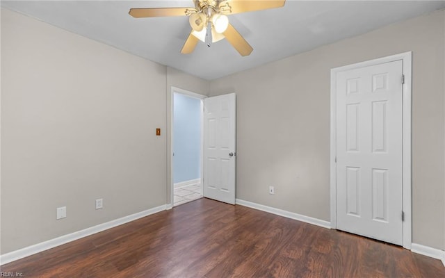4704 Lonewillow Ln, Virginia Beach, VA 23455 - unfurnished bedroom featuring wood finished floors, baseboards, and ceiling fan