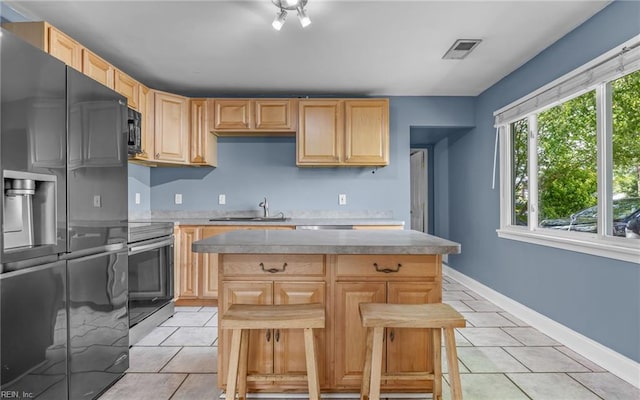 4704 Lonewillow Ln, Virginia Beach, VA 23455 - kitchen featuring fridge with ice dispenser, stainless steel electric range oven, light countertops, and light tile patterned floors