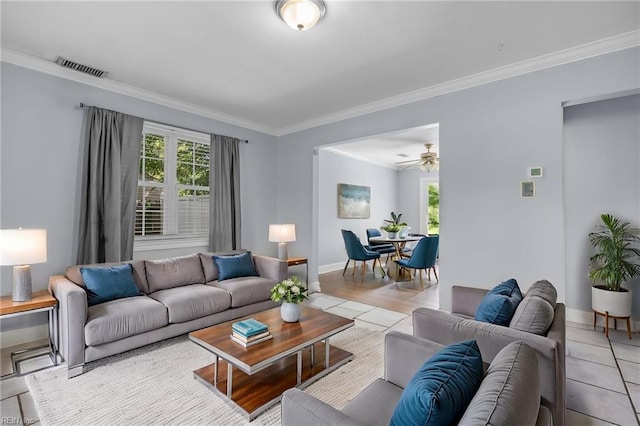 4704 Lonewillow Ln, Virginia Beach, VA 23455 - living room featuring crown molding, ceiling fan, light tile patterned floors, and baseboards