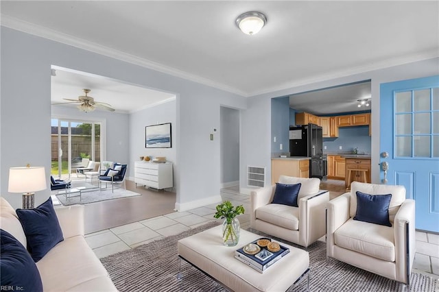 4704 Lonewillow Ln, Virginia Beach, VA 23455 - living room featuring ornamental molding, a ceiling fan, baseboards, and light tile patterned floors