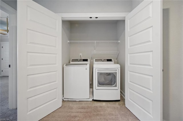 653 Waters Rd, Chesapeake, VA 23322 - laundry room with independent washer and dryer and light carpet