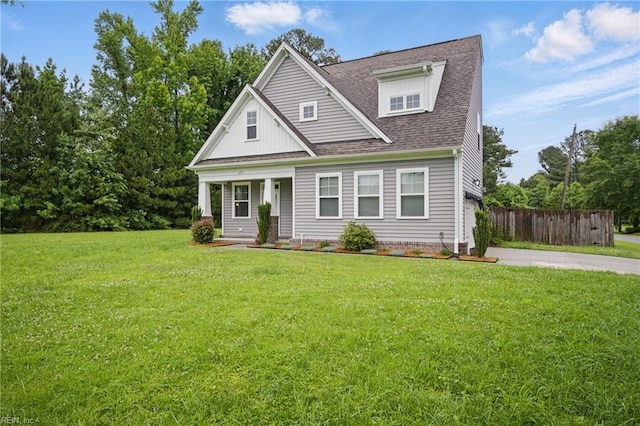 653 Waters Rd, Chesapeake, VA 23322 - view of front of house with a porch, a shingled roof, and concrete driveway