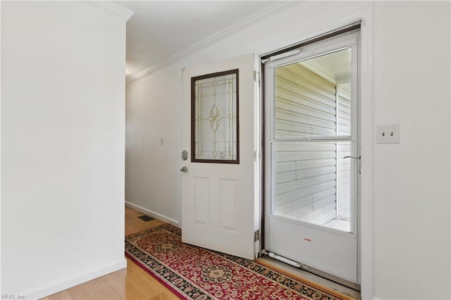 5 Still Harbor Ct, Hampton, VA 23669 - foyer entrance with light wood-style floors, crown molding, and baseboards