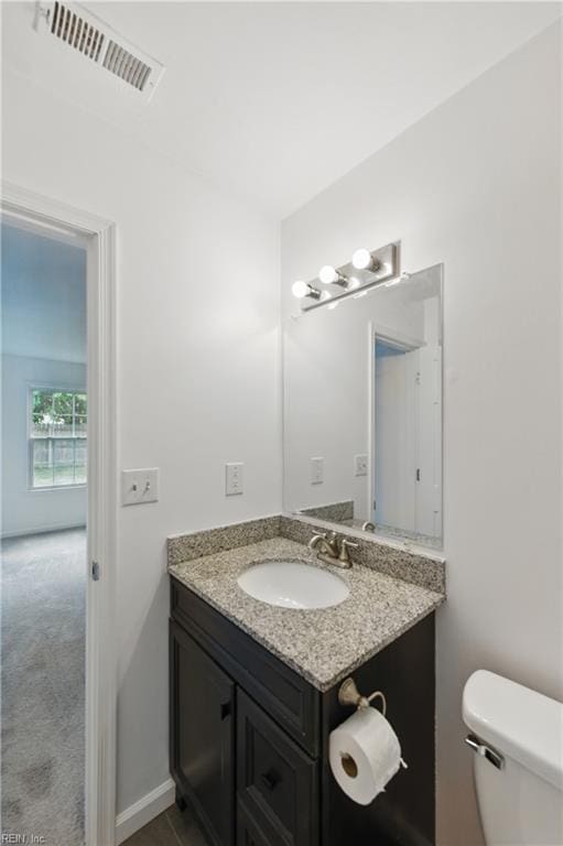 1713 Silver Springs Ct, Virginia Beach, VA 23456 - half bathroom featuring vanity and toilet