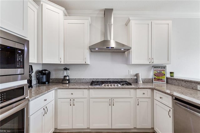 23 Mallory Way, Hampton, VA 23664 - kitchen with wall chimney range hood, appliances with stainless steel finishes, white cabinetry, and light stone counters