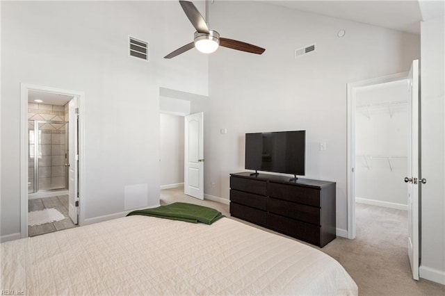 23 Mallory Way, Hampton, VA 23664 - bedroom featuring a walk in closet, light colored carpet, high vaulted ceiling, a closet, and baseboards