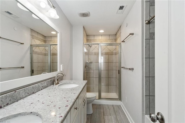 23 Mallory Way, Hampton, VA 23664 - full bath featuring toilet, double vanity, a shower stall, and baseboards