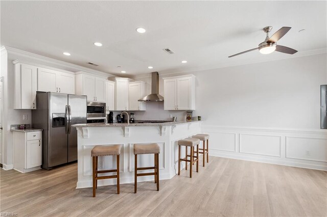23 Mallory Way, Hampton, VA 23664 - kitchen featuring stainless steel appliances, wall chimney exhaust hood, ornamental molding, a breakfast bar area, and a sink