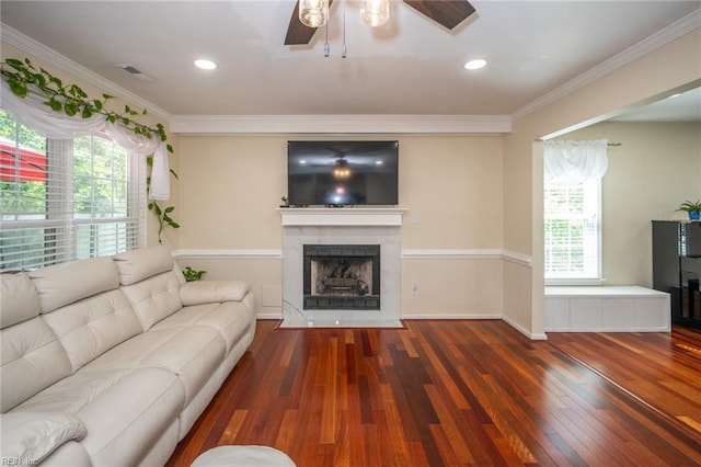 1020 Baydon Ln, Chesapeake, VA 23322 - living area featuring ceiling fan, hardwood / wood-style flooring, healthy amount of natural light, ornamental molding, and a fireplace