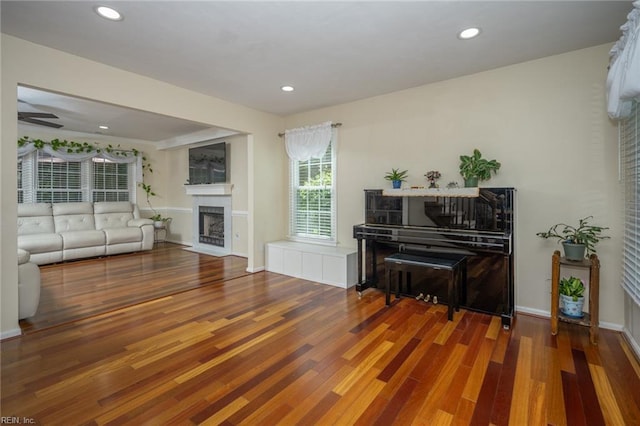 1020 Baydon Ln, Chesapeake, VA 23322 - living room with a fireplace with flush hearth, wood finished floors, recessed lighting, baseboards, and ceiling fan