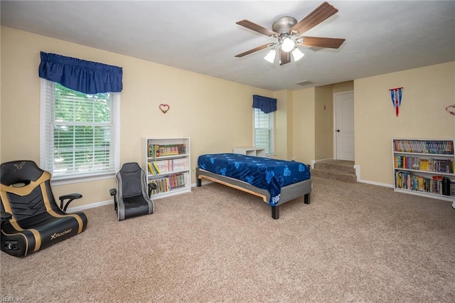 1020 Baydon Ln, Chesapeake, VA 23322 - carpeted bedroom featuring multiple windows, baseboards, and ceiling fan