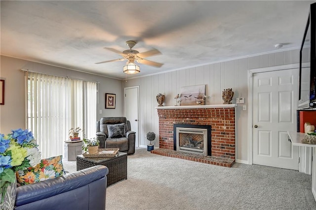 1052 Sunnyside Dr, Virginia Beach, VA 23464 - living room with a ceiling fan, ornamental molding, carpet floors, and a fireplace